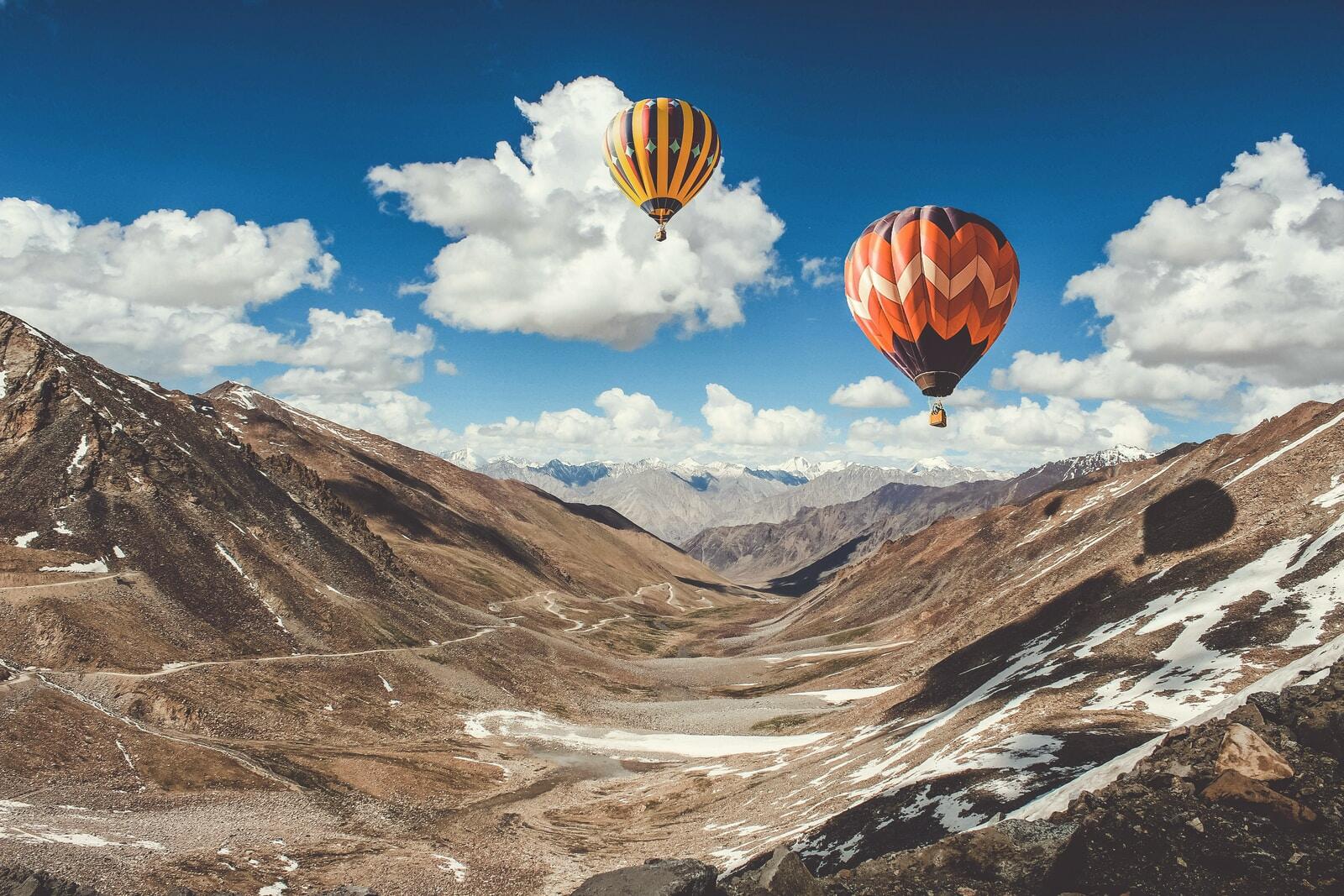 two hot air balloons floating